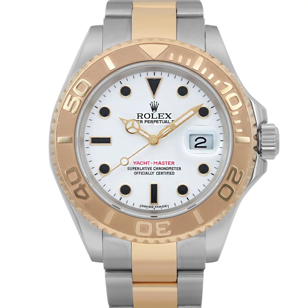 An image of a pre-owned wristwatch, captured in a front close-up shot focusing on the watch face. The watch features a white dial with gold hour markers and hands. The bezel is two-toned, with gold and silver elements, and the watch has a date display on the right side. The bracelet is also two-toned, matching the bezel.