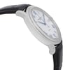 An image of a Raymond Weil men's wristwatch in a side profile view, showing the opposite side of the crown. The watch features a round stainless steel case with a silver tapisserie patterned dial. The steel bezel complements the silver dial, and the watch is equipped with a black leather band. The timepiece is angled slightly to highlight its sleek design, displaying its excellent condition as a display model. The date indicator feature is subtly visible, enhancing its formal style. The photograph is taken at a close range, emphasizing the watch's dress elegance.