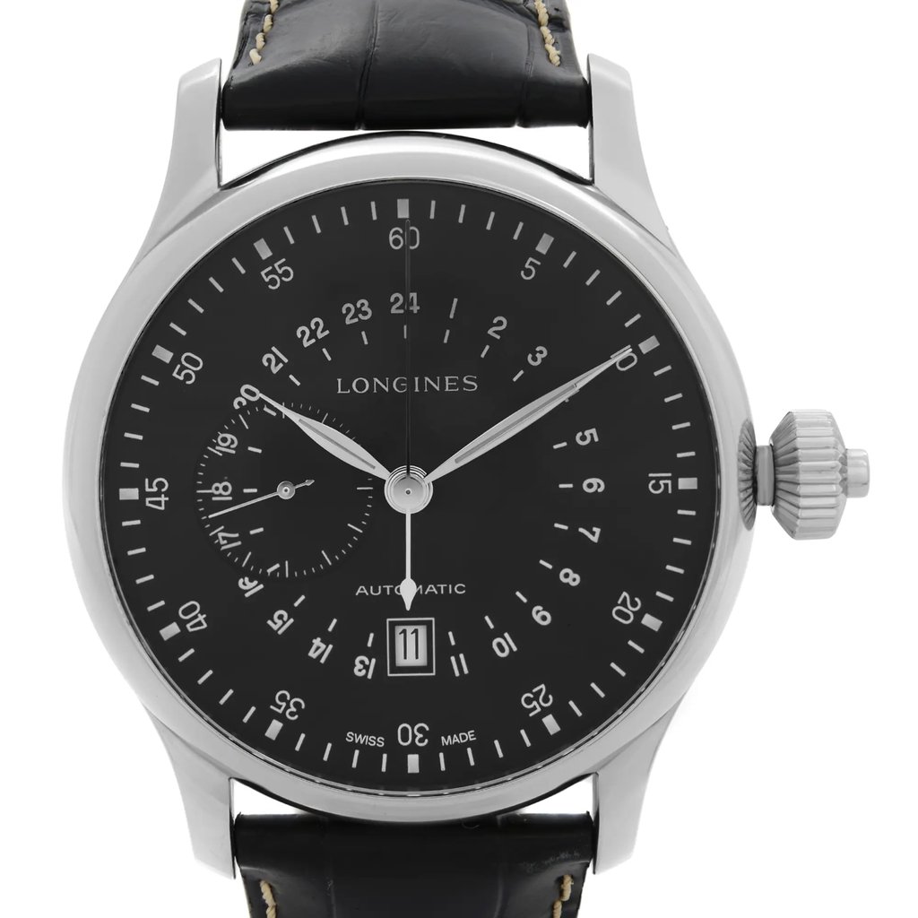 An image of a wristwatch taken from a front close-up angle, showcasing the watch face. The timepiece is a display model with a sleek black dial, silver hour markers, and hands. The watch features a date window at the bottom and a smaller subdial on the left. The crown is visible on the right side of the polished silver case, and the watch is fitted with a black leather strap.