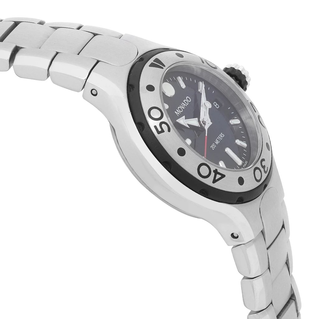 An image of a pre-owned wristwatch viewed from the side profile, opposite the crown. The angle captures the watch's stainless steel band and bezel, highlighting the engraved numerals. The watch face is partially visible, showing the brand name and water resistance details. The photo is taken at a close distance, emphasizing the texture and design elements.