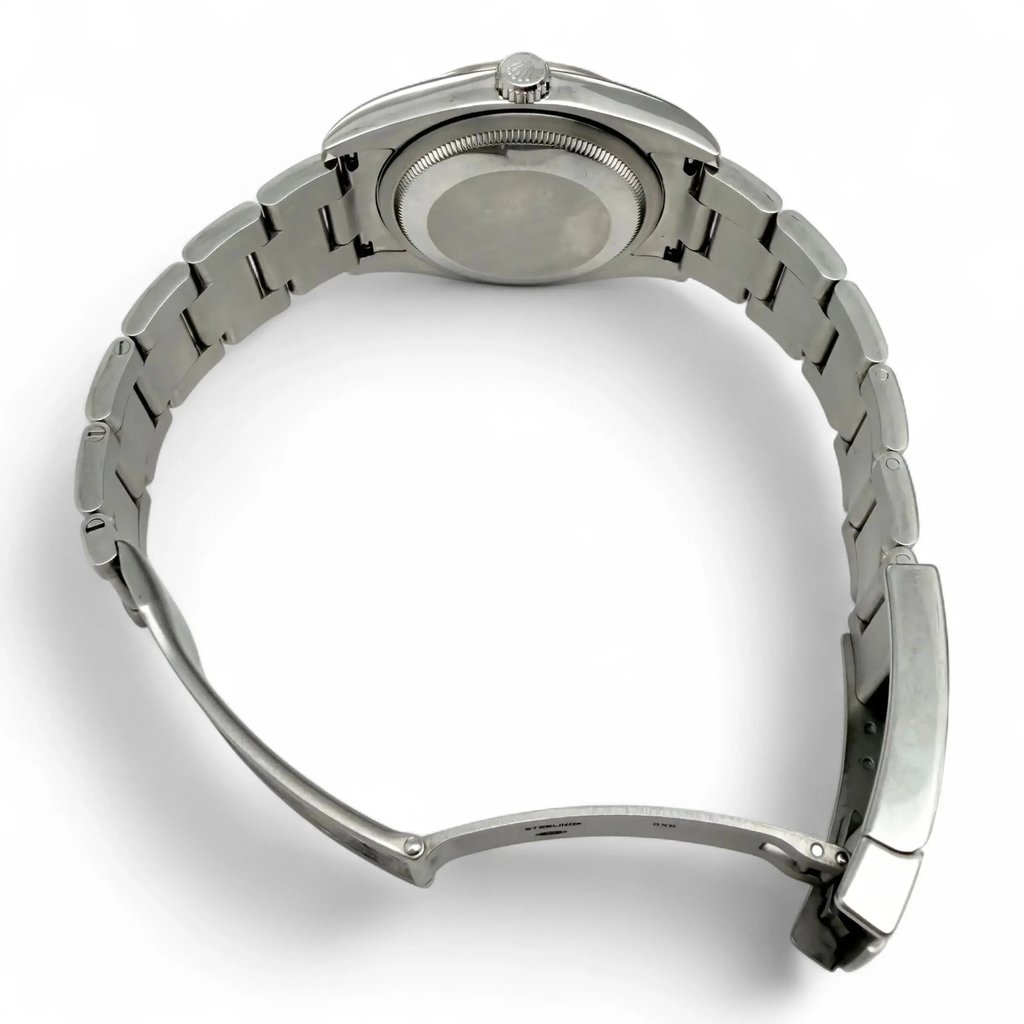 Back View Of Screwback Back Case And Open Stainless Steel Band Of Rolex 116034 Watch Pre Owned Condition