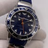 An image of a Wristwatch by Tommy Bahama. This Pre Owned item is designed for Men, featuring a Diver style. It has a Quartz movement and an Analog display with a Blue dial color. The indices include 12-Hour Dial,Non-Numeric Hour Marks. The band is made of Rubber and the case is made of Stainless Steel. The watch has a Round shape with a case size of 44 mm and a case thickness of 14 mm.