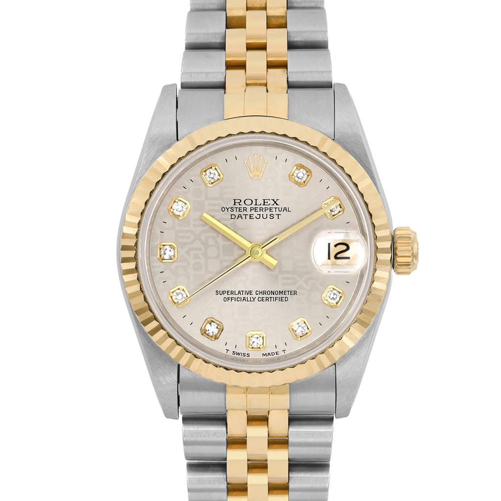 An image of a pre-owned wristwatch captured in a front close-up shot, focusing on the watch face. The watch features a silver and gold two-tone design with a gold fluted bezel. The face displays diamond hour markers and a date window at the 3 o'clock position. The bracelet consists of alternating gold and silver links.