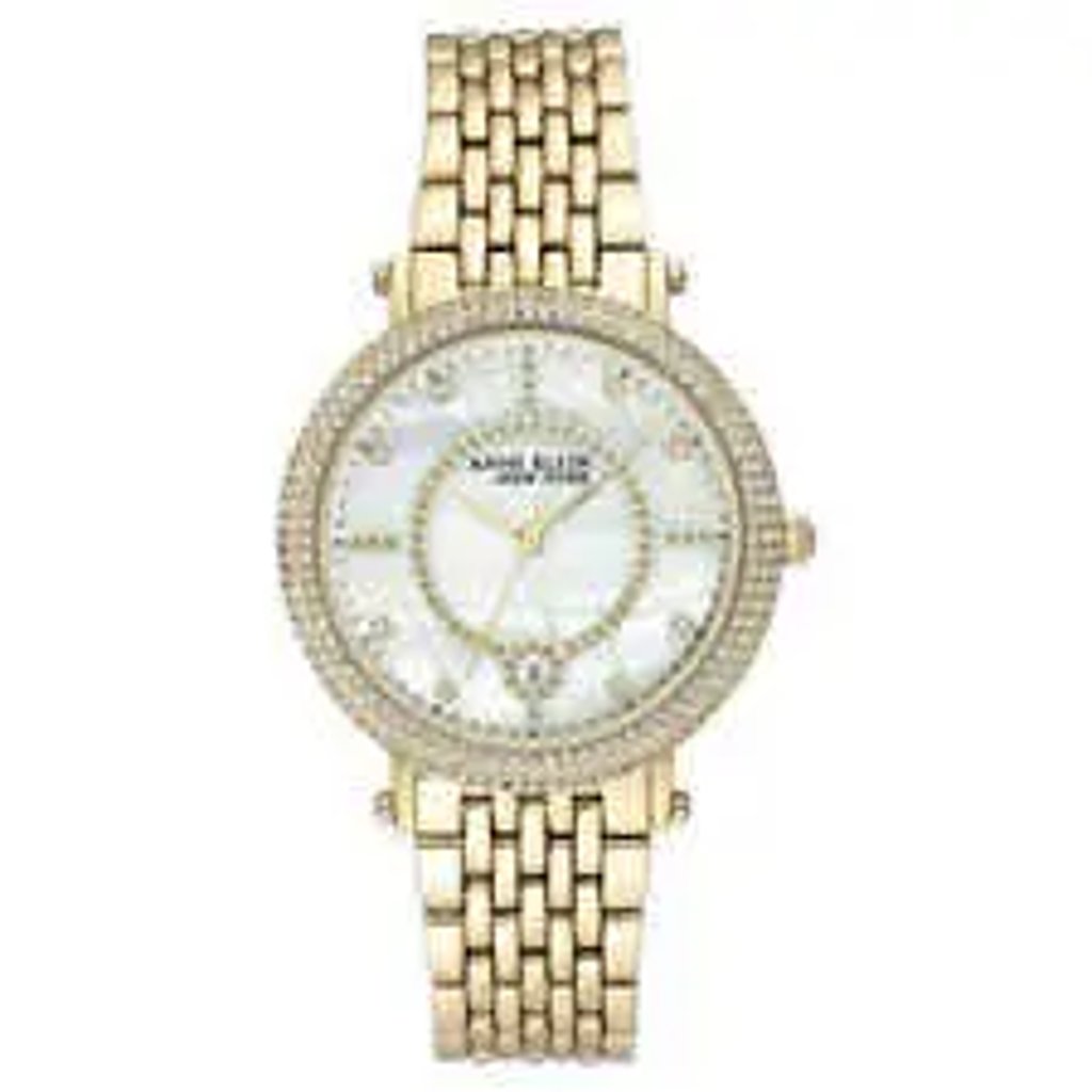 An image of a Wristwatch by Anne Klein. This Display Model item is designed for Women, featuring a Dress/Formal style. It has a Quartz movement and an Analog display with a White dial color. The indices include 12-Hour Dial,Non-Numeric Hour Marks. The band is made of Brass and the case is made of Stainless Steel. The watch has a Round shape with a case size of 36 mm and a case thickness of 9.5 mm.