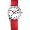An image of a Wristwatch by Mondaine. This Display Model item is designed for Women, featuring a Casual style. It has a Quartz movement and an Analog display with a White dial color. The indices include 12-Hour Dial,No Hour Marks,Non-Numeric Hour Marks. The band is made of Leather and the case is made of Stainless Steel. The watch has a Round shape with a case size of 30 mm and a case thickness of 9 mm.