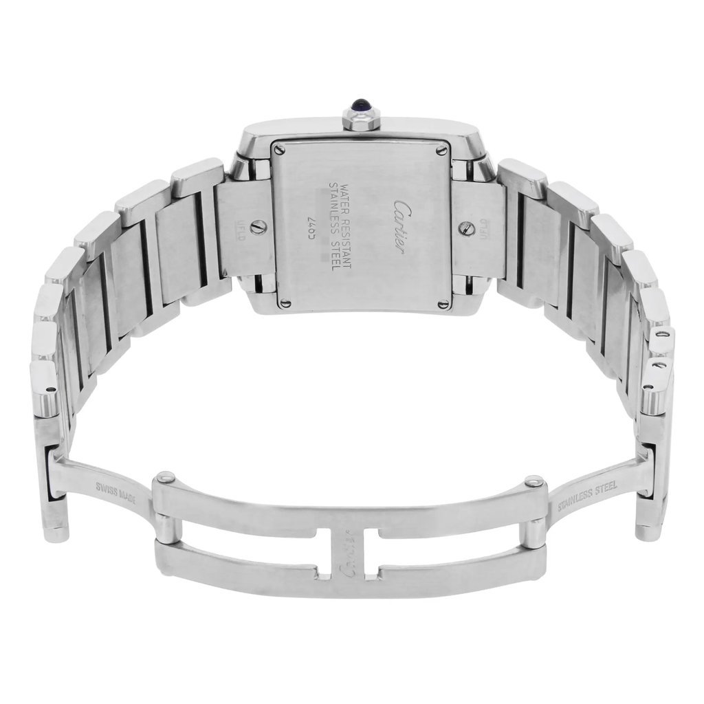 An image of a pre-owned Cartier women's wristwatch, viewed from the back at a slight angle to showcase the stainless steel bracelet and case. The watch is positioned centrally, with the focus on the clasp and backplate, which features brand engravings and a date indicator. The angle highlights the watch's craftsmanship, with details like the polished links and a small blue gem on the crown visible. The close-up perspective emphasizes the watch's elegant design and condition.