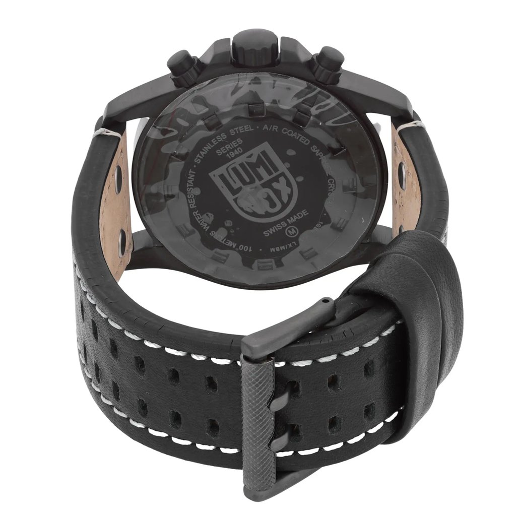 An image of a Wristwatch by Luminox. This Unworn item is designed for Men, featuring a Casual style. It has a Quartz movement and an Analog display with a Black dial color. The indices include 12-Hour Dial,Arabic Numerals,Multi Dial. The band is made of Leather and the case is made of Stainless Steel. The watch has a Round shape with a case size of 45 mm and a case thickness of 15 mm.