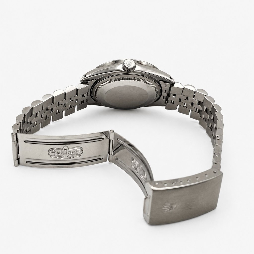 Back View Of Solid Back Case And Open Stainless Steel Band Of Rolex 16014 Watch Pre Owned Condition