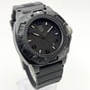 An image of a Wristwatch by Luminox. This Pre Owned item is designed for Men, featuring a Diver,Military style. It has a Quartz movement and an Analog display with a Black dial color. The indices include 12-Hour Dial,Arabic Numerals,Stick Indexes. The band is made of Rubber and the case is made of Carbon. The watch has a Round shape with a case size of 43 mm and a case thickness of 14 mm.