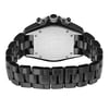 An image of a pre-owned wristwatch showing the back view with an open clasp. The watch is positioned horizontally with the back casing visible, revealing a brushed metal surface secured by small screws. The wristband has a sleek, polished black finish. The image is taken from a close distance, highlighting the clasp mechanism and the back of the watch.