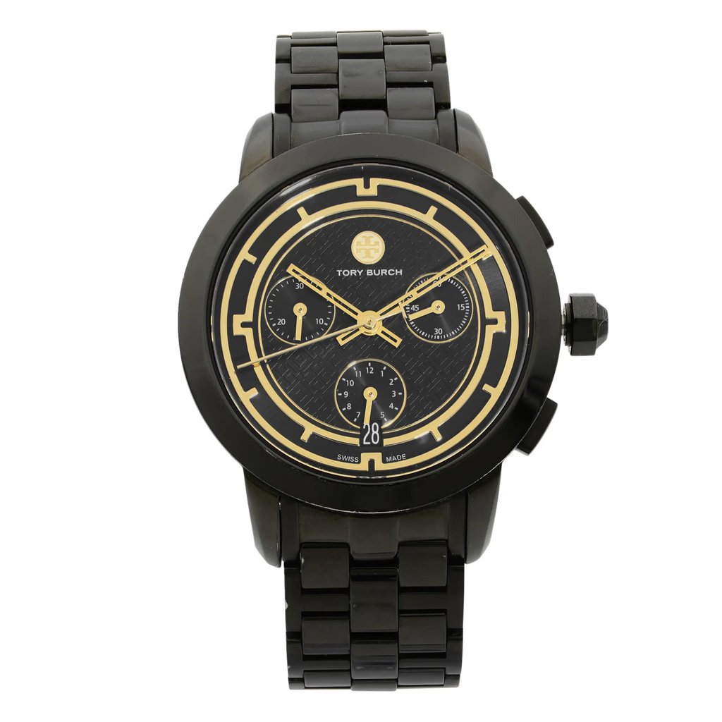 An image of a Wristwatch by Tory Burch. This Pre Owned item is designed for Women, featuring a Sport style. It has a Quartz movement and an Analog display with a Black dial color. The indices include Non-Numeric Hour Marks,Sticks. The band is made of Stainless Steel and the case is made of Stainless Steel. The watch has a Round shape with a case size of 37 mm and a case thickness of 10 mm.