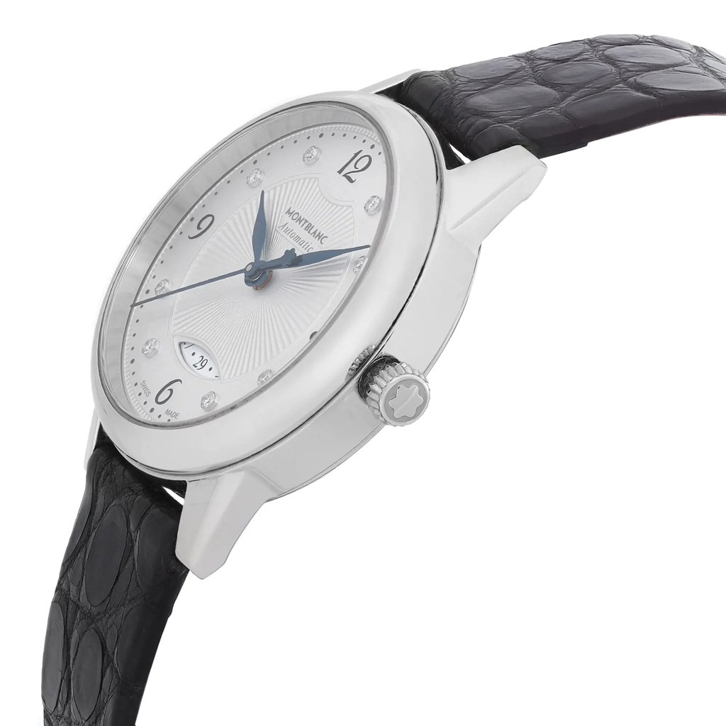 An image of a pre-owned Montblanc wristwatch for women in a casual style, presented in a side profile view highlighting the crown. The watch features a round, stainless steel case with a gray bezel, and a silver dial that has a date indicator. It is fitted with a black leather band, and the picture is taken from a close distance, showing the watch at a slight angle to emphasize the side profile and crown detail.