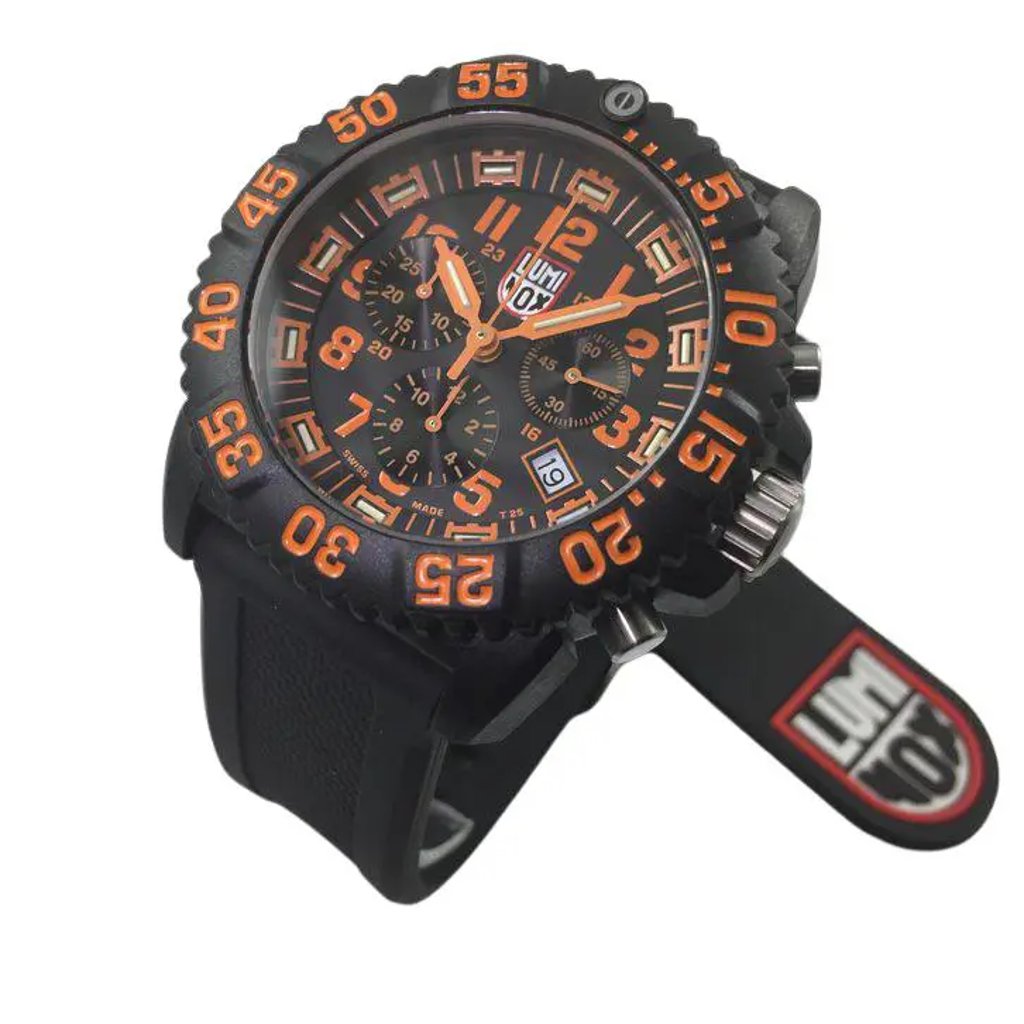 An image of a Wristwatch by Luminox. This Pre Owned item is designed for Men, featuring a Casual,Diver,Military style. It has a Quartz movement and an Analog display with a Black dial color. The indices include 12-Hour Dial,Arabic Numerals,Easy to Read/Large Numerals. The band is made of Rubber and the case is made of Carbon. The watch has a Round shape with a case size of 44 mm and a case thickness of 15 mm.