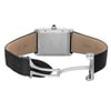 An image of a men's Cartier wristwatch, shown from the back with an open deployant clasp. The stainless steel screwback case is rectangular and positioned centrally in the frame. leather band is visible with a textured black material on the exterior and a tan interior with the brand name 'Cartier' embossed. The watch is photographed at a slight angle, showcasing the side of the case and the clasp mechanism, and is taken from a medium distance allowing clear visibility of the watch's details. The watch may have minor blemishes due to store handling.