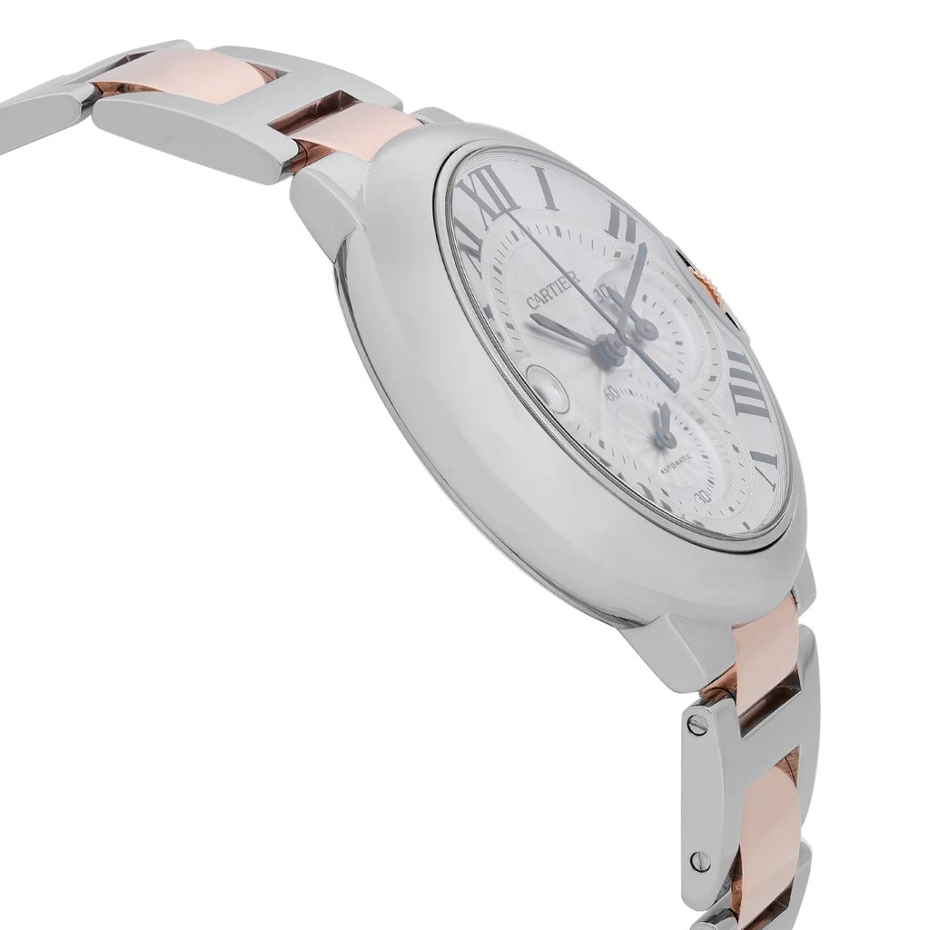 An image of a pre-owned Cartier men's wristwatch in a side profile view opposite of the crown, showcasing a round stainless steel case with a silver dial. The watch features a chronograph, date indicator, and small seconds subdial. The bezel color is steel and the band is made of stainless and solid gold, highlighting its dress/formal luxury style. The angle provides a clear view of the watch's side and partially displays the band, demonstrating the blend of materials and the elegant design. The image is taken from a close distance, focusing on the side details of the watch.