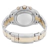 An image of a pre-owned wristwatch viewed from the back, showcasing the clasp in a closed position. The angle is slightly elevated, providing a clear view of the stainless steel and gold-toned bracelet. The watch's case and crown are visible, highlighting the intricate details. The photograph is taken from a close distance, emphasizing the watch's polished finish and craftsmanship.