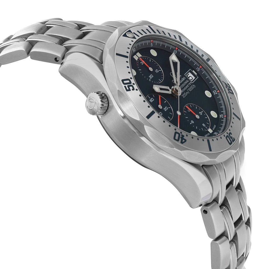 An image of a pre-owned OMEGA men's diver wristwatch, shown in a side profile view opposite the crown. The watch has a round stainless steel case and band, featuring a gray bezel and a blue dial with chronograph and date indicator. Luminous hands are visible on the dial, and a helium escape valve is positioned on the side of the case. The image is taken from a close, slightly elevated angle to highlight the watch's side profile and design details. Light scratches on the bezel. Minor signs of wear on the watch.