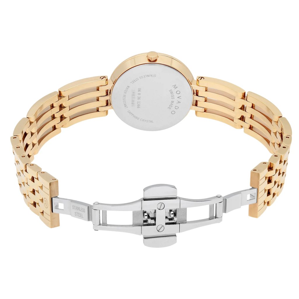 An image of a Wristwatch by Movado. This Pre Owned item is designed for Women, featuring a Dress/Formal style. It has a Quartz movement and an Analog display with a White dial color. The indices include No Hour Marks. The band is made of Stainless Steel and the case is made of Stainless Steel. The watch has a Round shape with a case size of 28 mm and a case thickness of 6 mm.