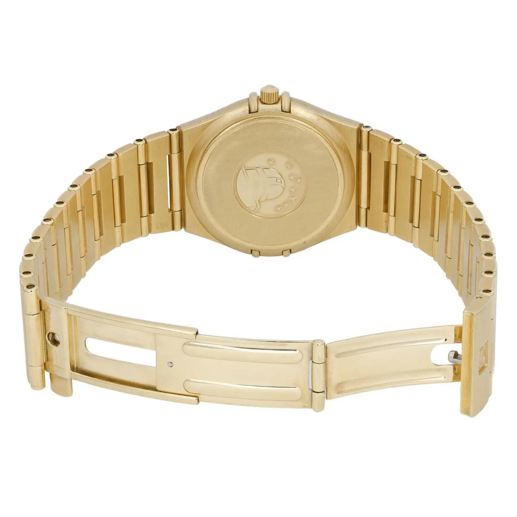 An image of a pre-owned wristwatch shown from the back view with an open clasp. The watch is positioned upright and photographed from a slight angle to highlight the bracelet and clasp details. The distance is close enough to clearly display the design and markings on the back of the watch case.