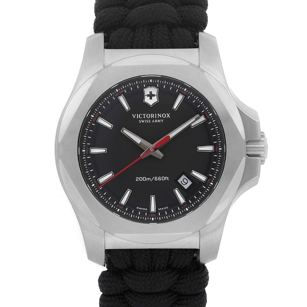 An image of a Wristwatch by Victorinox. This Display Model item is designed for Men, featuring a Casual style. It has a Quartz movement and an Analog display with a Black dial color. The indices include 12-Hour Dial,Seconds Hand,Stick Indexes. The band is made of Nylon and the case is made of Stainless Steel. The watch has a Round shape with a case size of 43 mm and a case thickness of 13 mm.