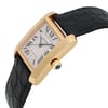 An image of a pre-owned Cartier unisex adult wristwatch, positioned at a close angle. The watch features a gold rectangular case with a white dial displaying Roman numerals and a date indicator at the bottom left. It has a black leather strap and a prominent crown with a blue cabochon. The watch is viewed from the side, emphasizing its elegant design.