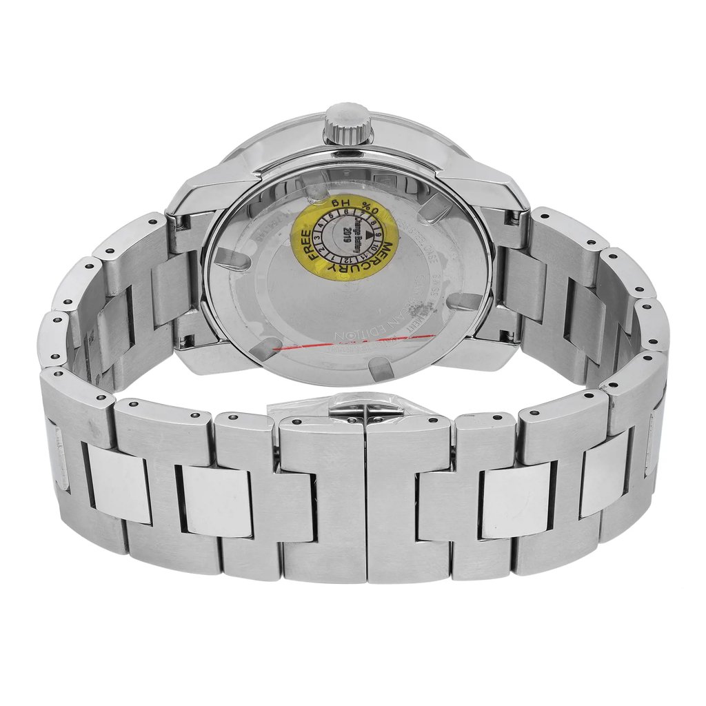 An image of a wristwatch displayed from the back view, showcasing the closed clasp. The angle is slightly elevated, providing a clear view of the metal bracelet and the watch case. The image is taken at a close distance, highlighting details such as the brand sticker on the watch back. The watch is a display model, appearing in pristine condition.