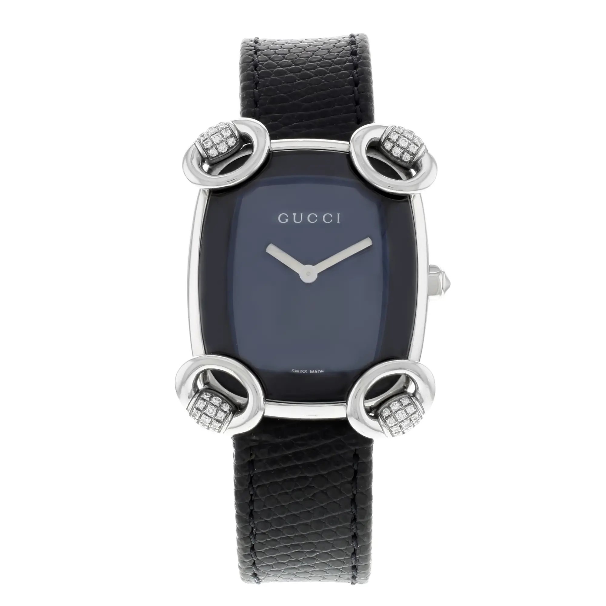 An image of a Wristwatch by Gucci. This Display Model item is designed for Women, featuring a Casual style. It has a Quartz movement and an Analog display with a Black dial color. The indices include 12-Hour Dial,Non-Numeric Hour Marks. The band is made of Leather and the case is made of Stainless Steel. The watch has a Tonneau shape with a case size of 28 mm and a case thickness of 10 mm.
