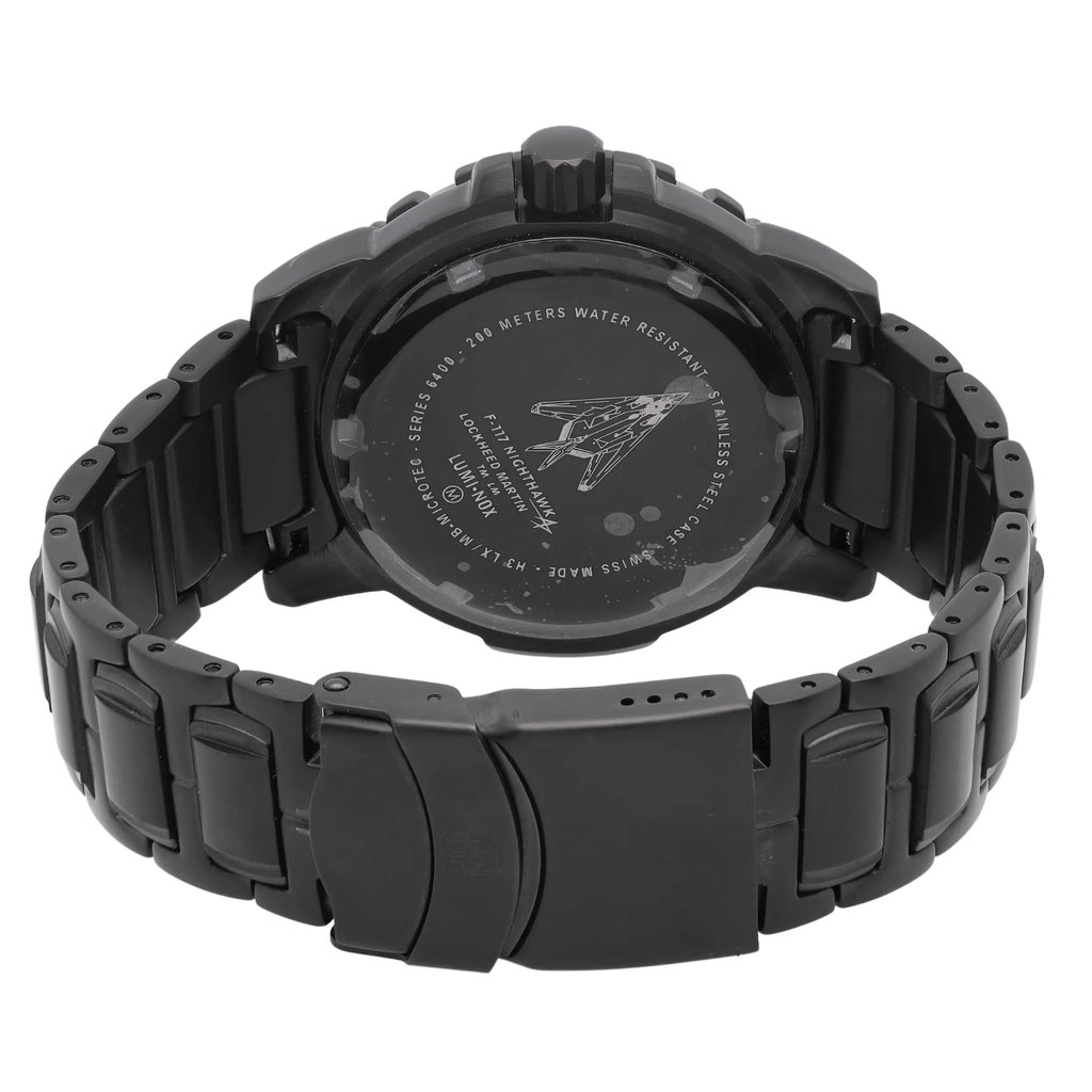 An image of a Wristwatch by Luminox. This New With Defects item is designed for Men, featuring a Military style. It has a Quartz movement and an Analog display with a Black dial color. The indices include 12-Hour Dial,24-Hour Dial,Arabic Numerals. The band is made of Stainless Steel and the case is made of Stainless Steel. The watch has a Round shape with a case size of 45 mm and a case thickness of 13 mm.
