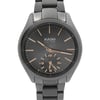 An image of a wristwatch shown in a front close-up shot, focusing on the watch face. The watch is in display model condition, with a sleek, dark metallic band. The face features a dual timer with gold-tone hour markers and hands, displaying a modern and sophisticated design.