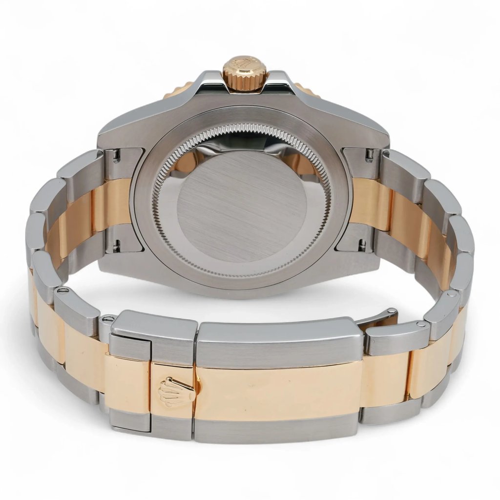 Back View Of Screwback Back Case And Closed Stainless Steel Band Of Rolex 116713LN Watch Pre Owned Condition