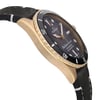 An image of a Wristwatch by Edox. This Pre Owned item is designed for Men, featuring a Dress/Formal style. It has a Mechanical (Automatic) movement and an Analog display with a Black gradient dial color. The indices include 12-Hour Dial,Round Indexes,Stick Indexes. The band is made of Leather and the case is made of Bronze. The watch has a Round shape with a case size of 42 mm and a case thickness of 12 mm.
