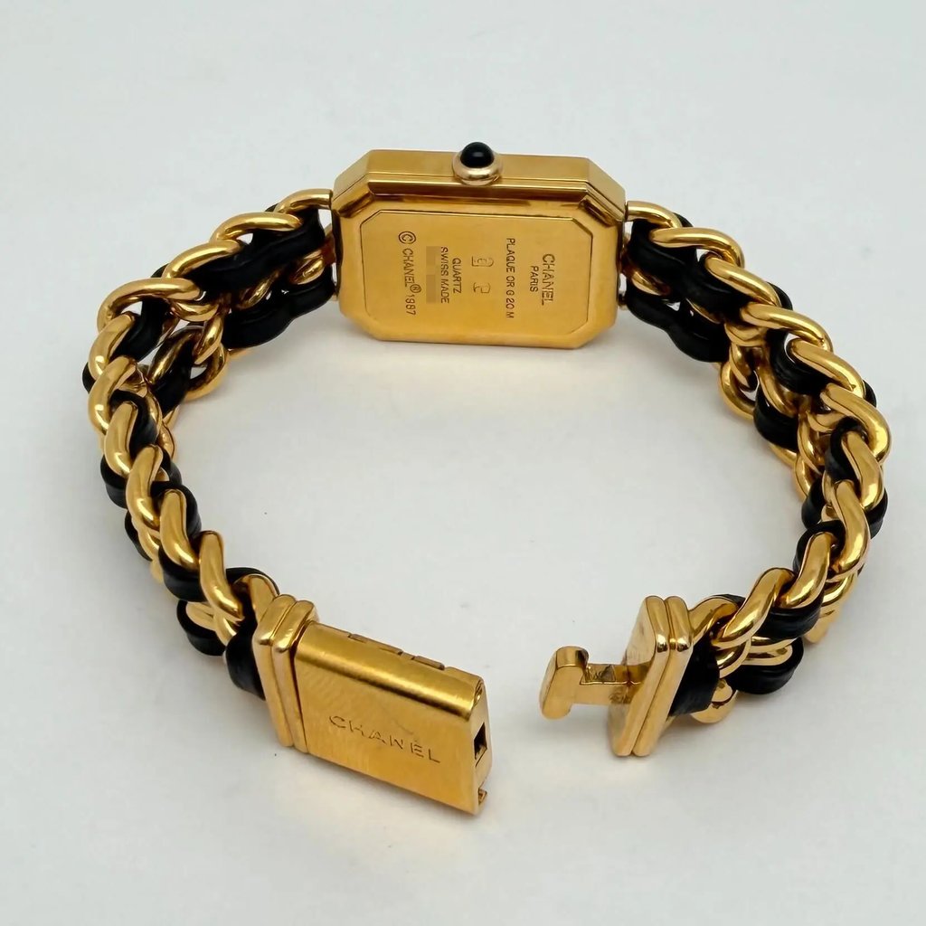 Back View Of Solid Back Case And Open Gold Plated,Leather Band Of CHANEL H0001 Watch Pre Owned Condition