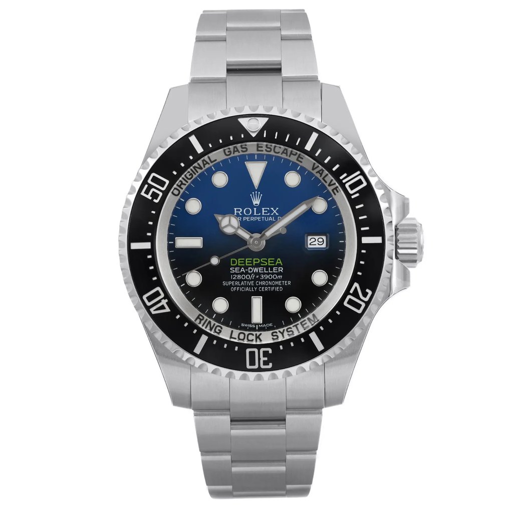 An image of a wristwatch shown from a front full frontal view. The watch is unworn and features a metallic band and case. The dial displays a gradient blue to black design with luminous markers and hands, and a date window at the 3 o'clock position. The bezel is marked with minute indicators. The image is taken at a close distance, highlighting the intricate details and craftsmanship of the watch.