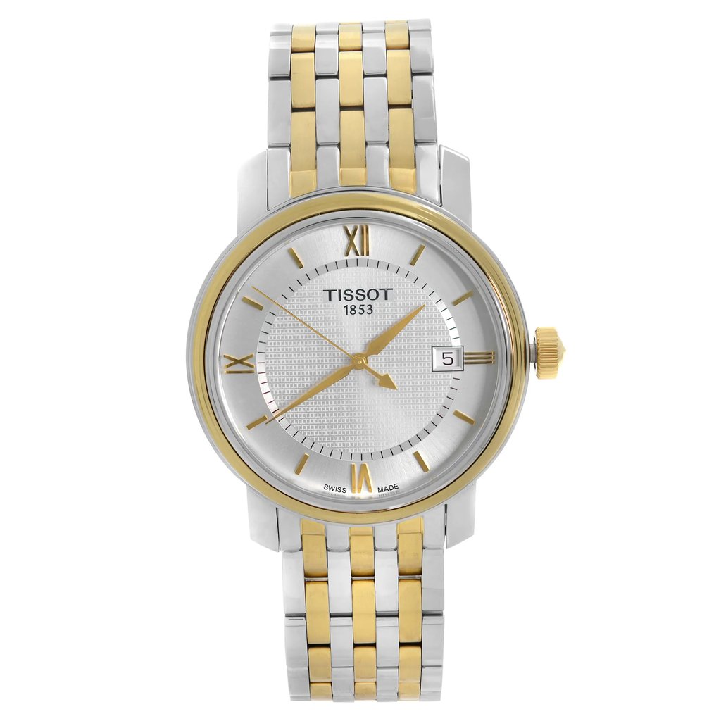 An image of a Wristwatch by Tissot. This Display Model item is designed for Men, featuring a Casual,Dress/Formal style. It has a Quartz movement and an Analog display with a Silver dial color. The indices include 12-Hour Dial,Non-Numeric Hour Marks,Roman Numerals,Stick Indexes. The band is made of Stainless Steel and the case is made of Stainless Steel. The watch has a Round shape with a case size of 40 mm and a case thickness of 9 mm.