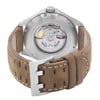 An image of a wristwatch viewed from the back, showcasing the intricate mechanical movement through a transparent case back with "Hamilton" branding. The watch is positioned upright, with the tan leather strap and clasp visible at a close angle. The stitching on the strap is detailed, highlighting its display model condition.