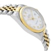 An image of a pre-owned men's Rolex wristwatch in a side profile view, opposite the crown, showing a dress/formal style. The watch features a round shape with a white dial and gold bezel. It has a stainless steel and yellow gold band, and a stainless steel case. The angle captures the watch from a close distance, highlighting its luminous hands and elegant design.