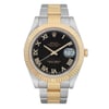 An image of a pre-owned Rolex Oyster Perpetual Datejust men's wristwatch in good condition, viewed from a full frontal angle. The watch features a round stainless steel case with a fluted gold bezel. It has a black dial with gold Roman numeral indices and a date indicator at the 3 o'clock position. The band is made of stainless steel with solid gold center links. The watch shows light signs of wear, such as minor scratches.