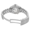 An image of an unworn women's OMEGA wristwatch in excellent condition, showcasing the back view with an open clasp. The watch features a stainless steel case and band, with an exhibition caseback revealing the internal mechanism. The round watch shape is complemented by a fold-over clasp with a double push button. The photograph captures the watch from a medium distance and slightly elevated angle, emphasizing the stainless steel material and craftsmanship.