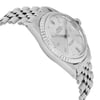 An image of a pre-owned wristwatch shown from a side profile view, opposite the crown. The watch features a silver metal bracelet and a silver-toned dial with baton hour markers. The image captures the watch at a slight angle, highlighting its sleek, polished finish and intricate details. The focus is close, emphasizing the design and craftsmanship of the timepiece.