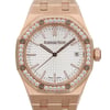 An image of a pre-owned men's luxury wristwatch by Audemars Piguet, captured in a front close-up shot focusing on the watch face. The octagon-shaped case is made of rose gold, matching the band material. The dial is silver with a "tapisserie" pattern, featuring stick indexes and a date function. The rose gold bezel is adorned with diamonds, and the watch includes luminous hands. The condition is classified as good.
