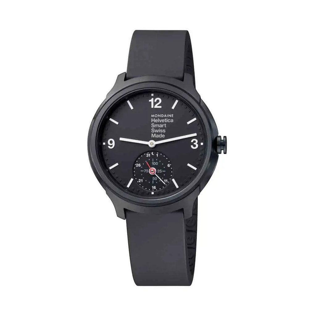 An image of a Wristwatch by Mondaine. This New With Defects item is designed for Men, featuring a Casual style. It has a Quartz movement and an Analog display with a Black dial color. The indices include 12-Hour Dial,Arabic Numerals,Stick Indexes. The band is made of Rubber and the case is made of Stainless Steel. The watch has a Round shape with a case size of 44 mm and a case thickness of 13 mm.