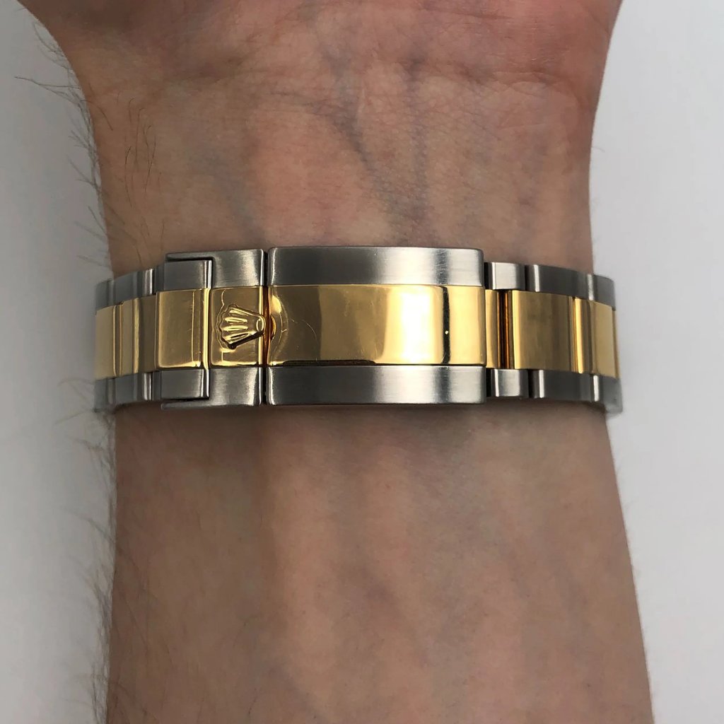 Back View Of Solid Back Case And Closed Stainless Steel Band Of Rolex 116713LN Watch Pre Owned Condition