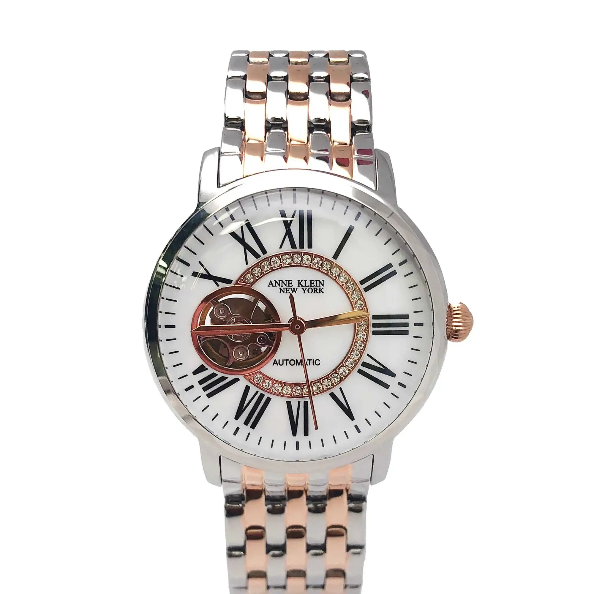 An image of a Wristwatch by Anne Klein. This New With Defects item is designed for Women, featuring a Dress/Formal style. It has a Mechanical (Automatic) movement and an Analog display with a White dial color. The indices include 12-Hour Dial,Roman Numerals. The band is made of Stainless Steel and the case is made of Stainless Steel. The watch has a Round shape with a case size of 35 mm and a case thickness of 13 mm.