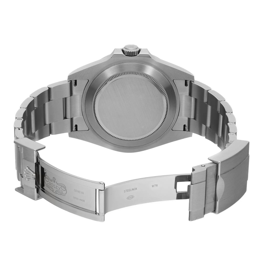 An image of a pre-owned wristwatch shown from the back view. The clasp is open, revealing details on the inner side of the band. The watch is positioned at a slight angle, highlighting the brushed metal finish of the case and links. The photograph is taken from a close distance, capturing the intricate details of the watch's craftsmanship.