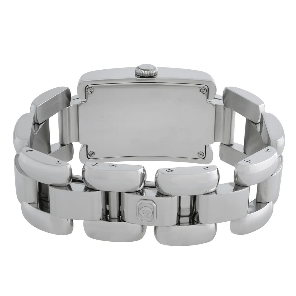 An image of a pre-owned wristwatch viewed from the back, highlighting the close clasp. The angle is straight on, showcasing the entire metal bracelet and clasp details. The watch case is centered, with the crown visible on the top edge. The image is taken from a close distance, emphasizing the polished links and the clasp design.