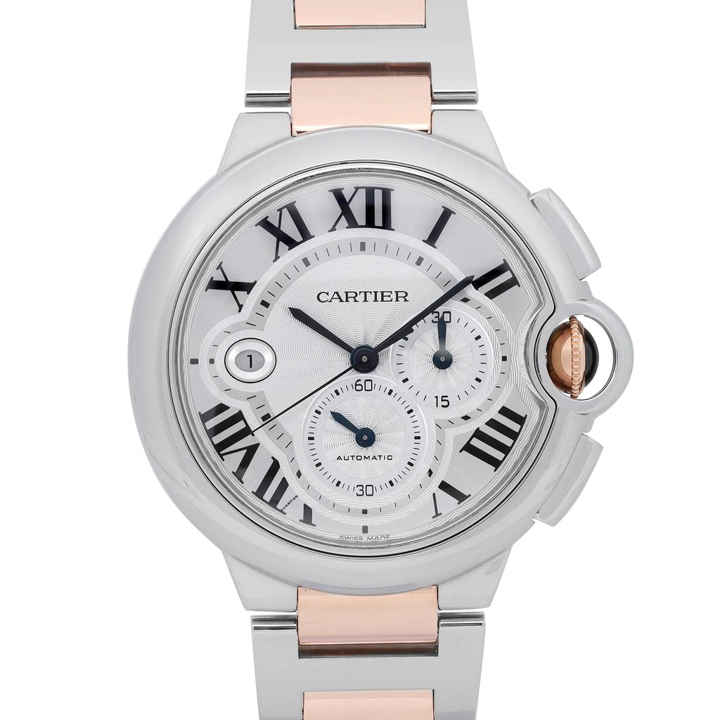 An image of a pre-owned Cartier men's wristwatch in excellent condition, featuring a front close-up view of the round watch face. The dial is silver with black Roman numeral indices and includes a chronograph, a date indicator, and a small seconds subdial. The bezel is steel, and the band is made of stainless steel with solid gold accents. The crown is visible on the right side of the case, and the watch is positioned straight-on at a close distance, providing a clear view of the details.