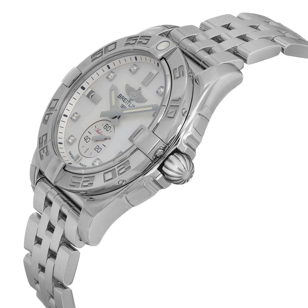 An image of a wristwatch taken from a side profile view. The watch displays a metallic band and a prominent crown on the side. The face of the watch includes visible hour markers and a detailed bezel. The angle highlights the watch's polished finish and sophisticated design, emphasizing the craftsmanship of the display model.