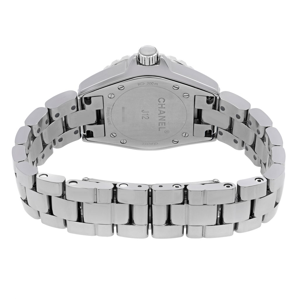 An image of a pre-owned wristwatch showing the back view at a close angle. The clasp is prominently displayed, with polished metal links and the watch's backplate visible. The brand name is engraved on the backplate, highlighting its design and craftsmanship.