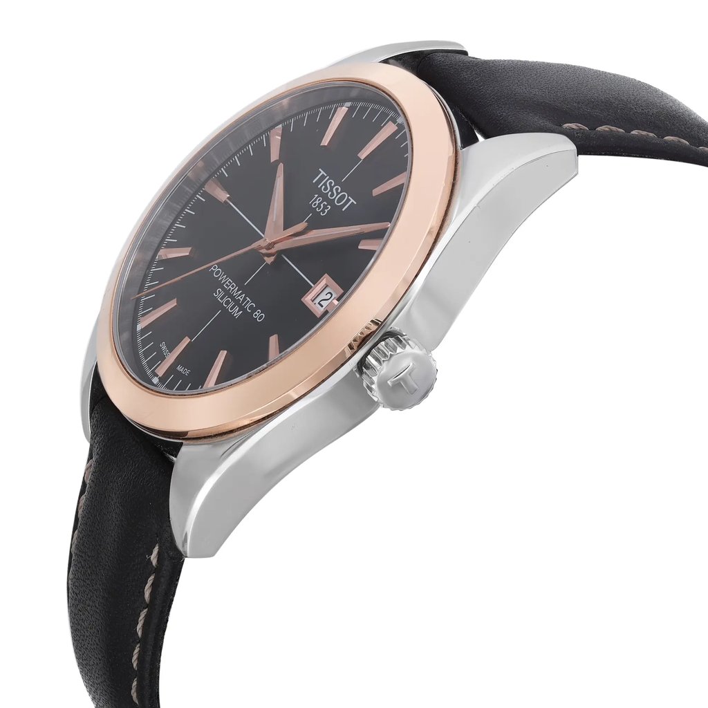 An image of a Wristwatch by Tissot. This Pre Owned item is designed for Men, featuring a Dress/Formal style. It has a Mechanical (Automatic) movement and an Analog display with a Black dial color. The indices include 12-Hour Dial,Stick Indexes. The band is made of Leather and the case is made of Stainless Steel. The watch has a Round shape with a case size of 40 mm and a case thickness of 11 mm.