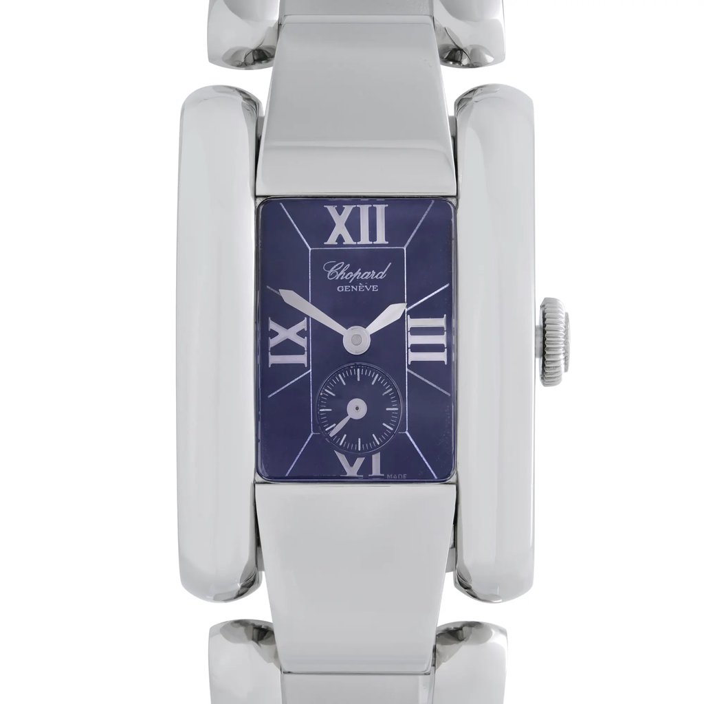 An image of a pre-owned wristwatch captured from a front close-up angle, showcasing the rectangular watch face. The dial is dark blue with Roman numerals and a separate small seconds subdial. The watch is positioned centrally, emphasizing the metallic bezel and band, with the crown visible on the right side.